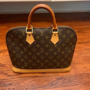 Louis Vuitton Alma Handbag